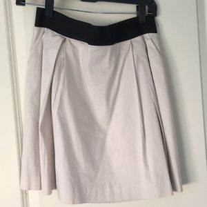 A-line cream skirt with black band